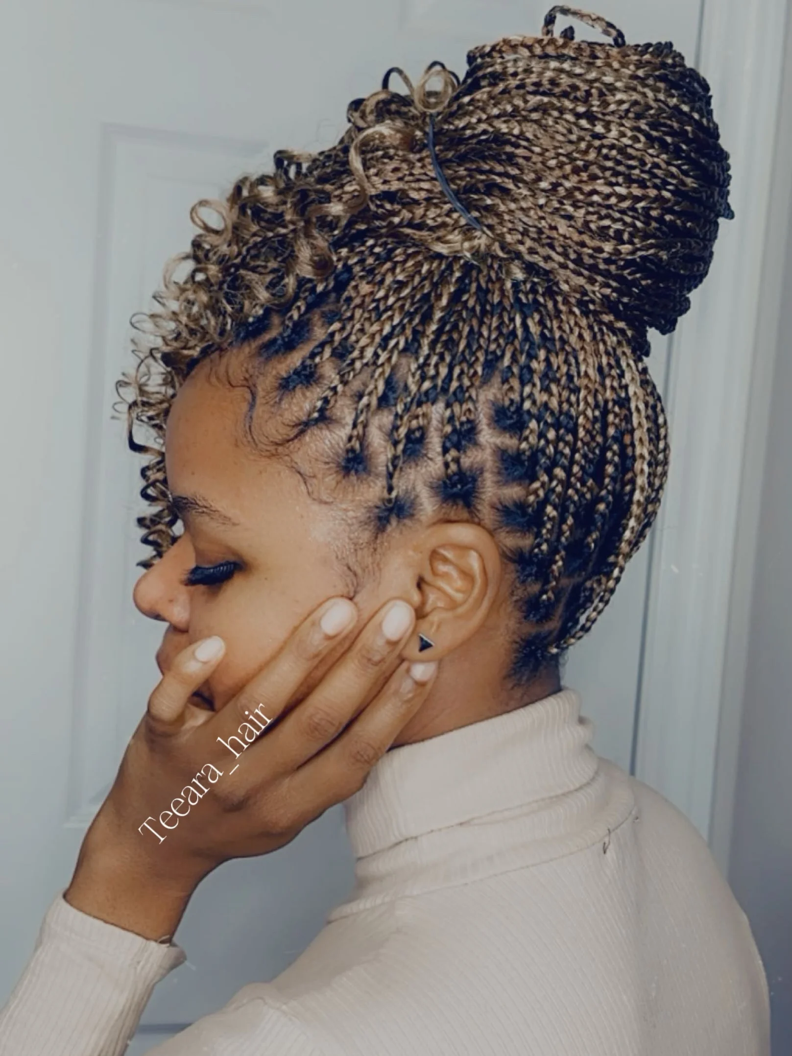 Small box braids with a blonde mix and front curls
