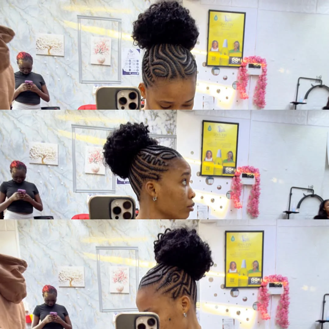 Patterned cornrows with a soft curly bun