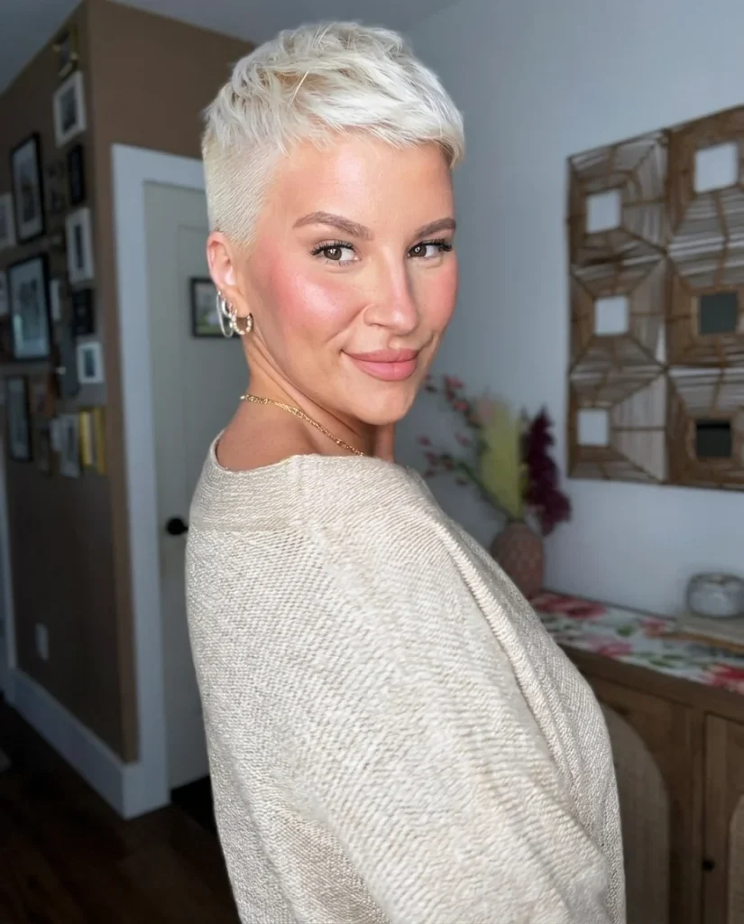 Micro pixie cut in icy platinum blonde with textured top