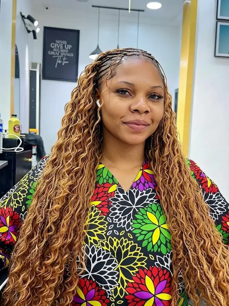 Honey-blonde boho braids with Fulani-style front cornrows and long waves