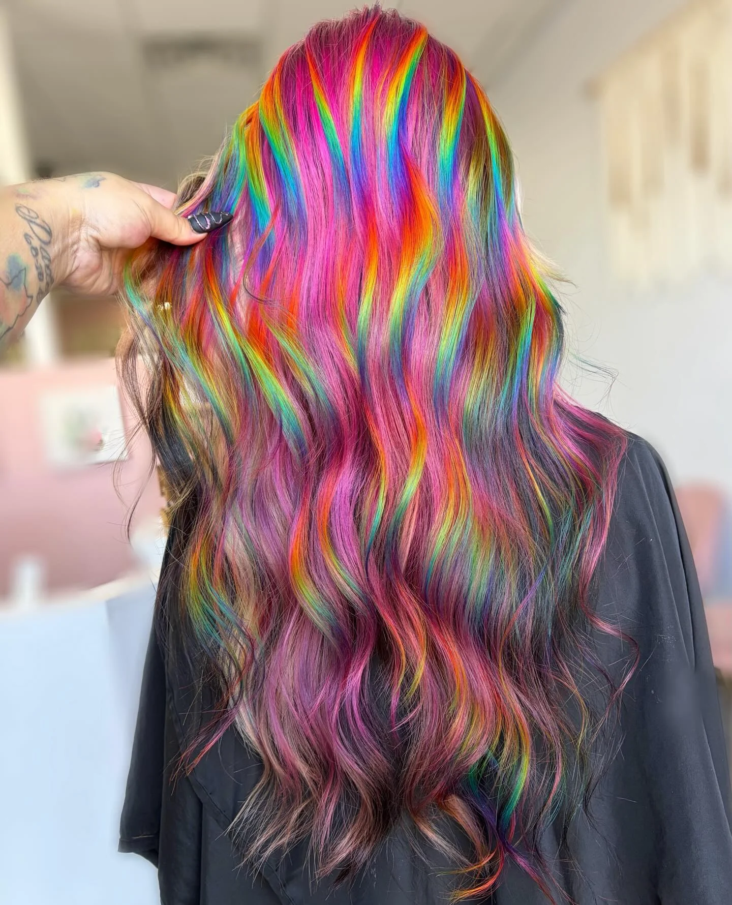 Long wavy rainbow mermaid hair with pink, magenta, orange, yellow, green and blue