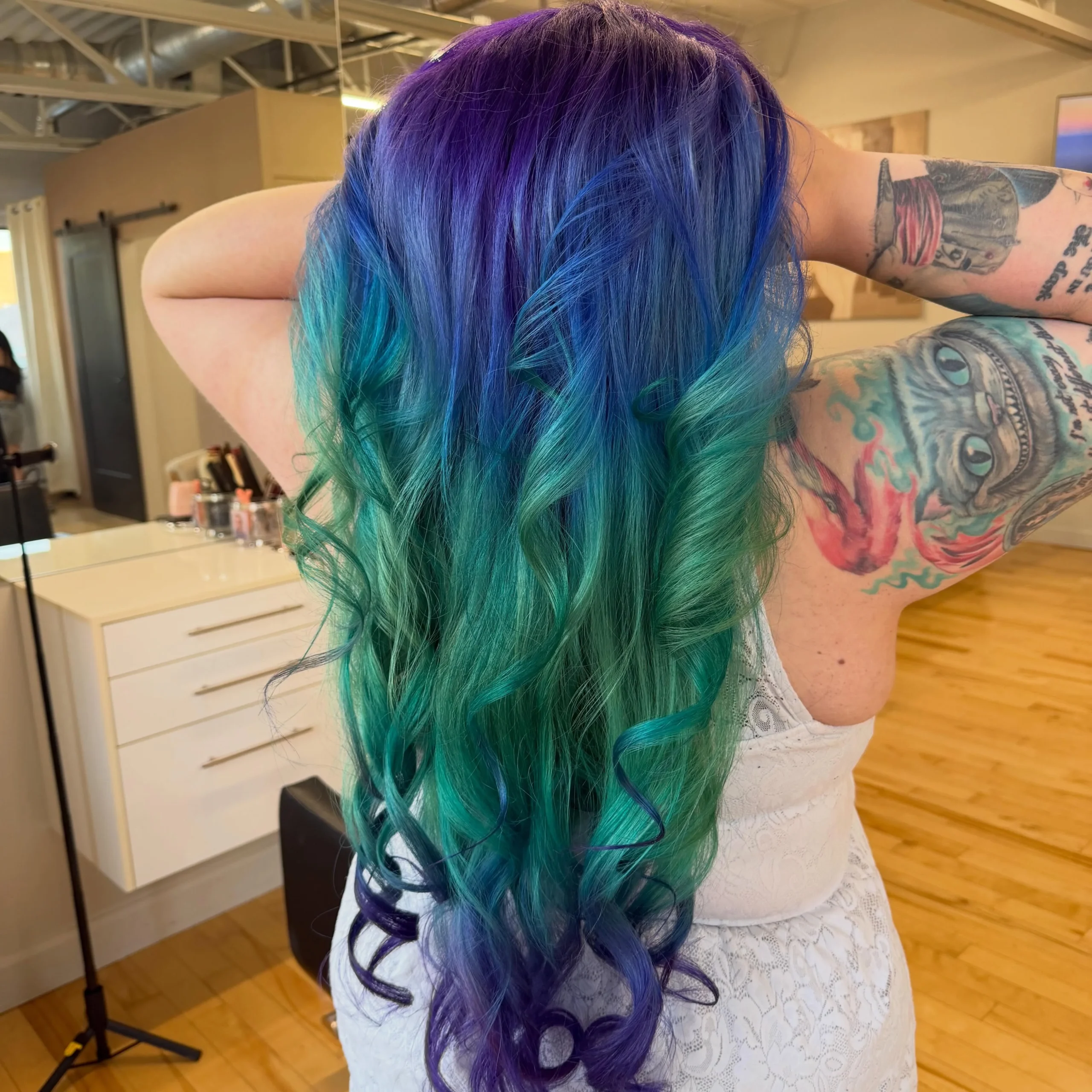 Very long curly mermaid hair in purple, blue, teal and emerald